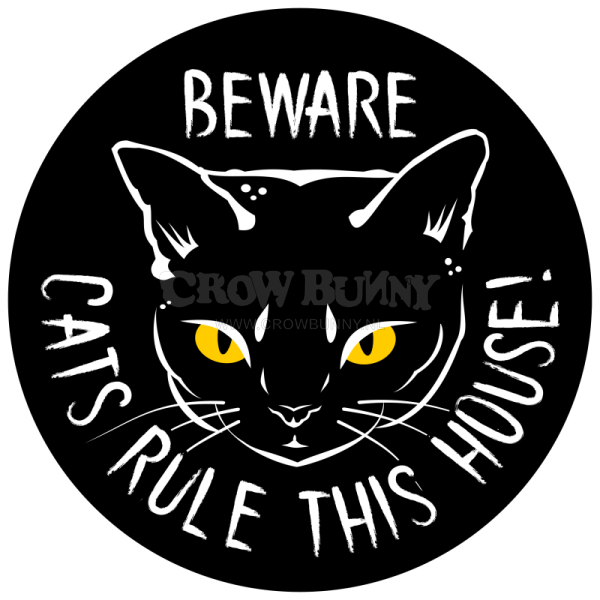 Sign: Cats rule this house